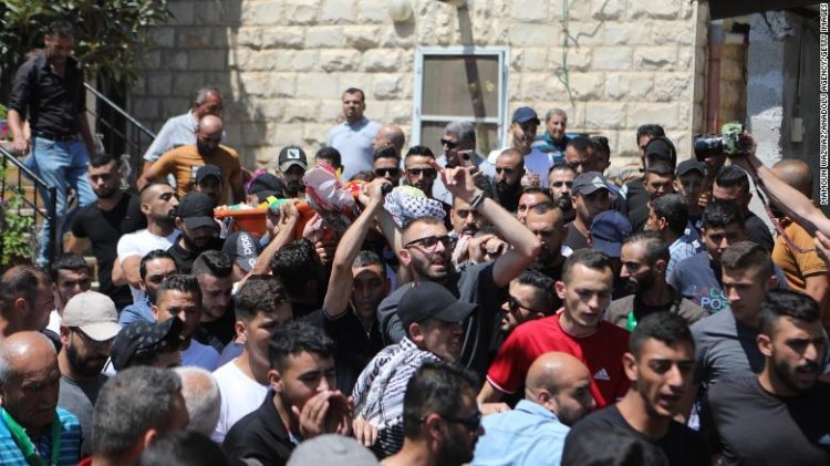 Palestinian man shot dead in violent clashes as 12-year old boy, also killed by Israeli soldiers, is buried