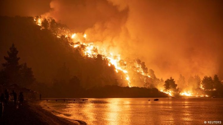 Thousands evacuated as wildfires rip through Greece