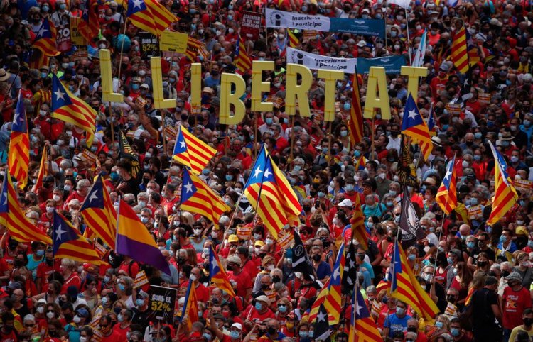 Catalan separatists hit streets for national day ahead of Madrid talks