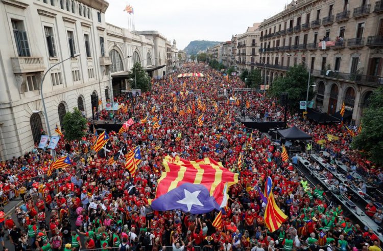 Catalan separatists hit streets for national day ahead of Madrid talks