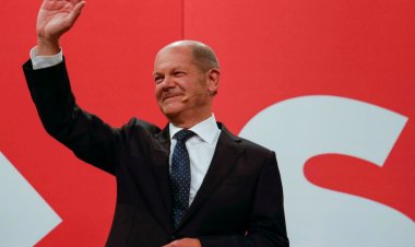 Germany's SPD, Greens, Liberals announce initial deal for next govt