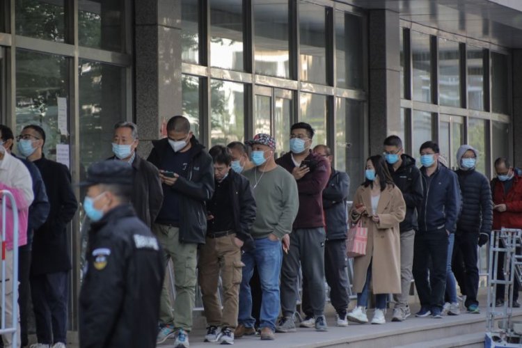 Beijing residents queue for tests as China battles new Covid outbreak