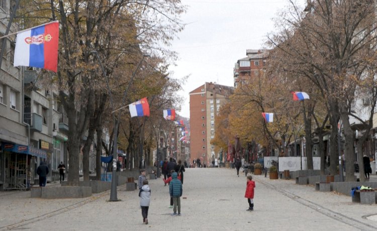 In Kosovo's Mitrovica, Serbian flags and nationalist murals blanket the streets of its Serb enclave