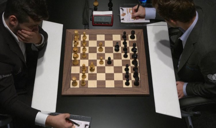 Norway's Magnus Carlsen retains world chess title