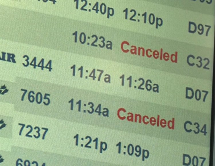 2,300 flights canceled as Omicron hits holiday travel