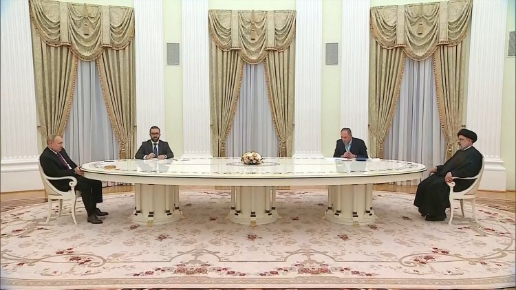 Russian President Putin hosts his Iranian counterpart Raisi