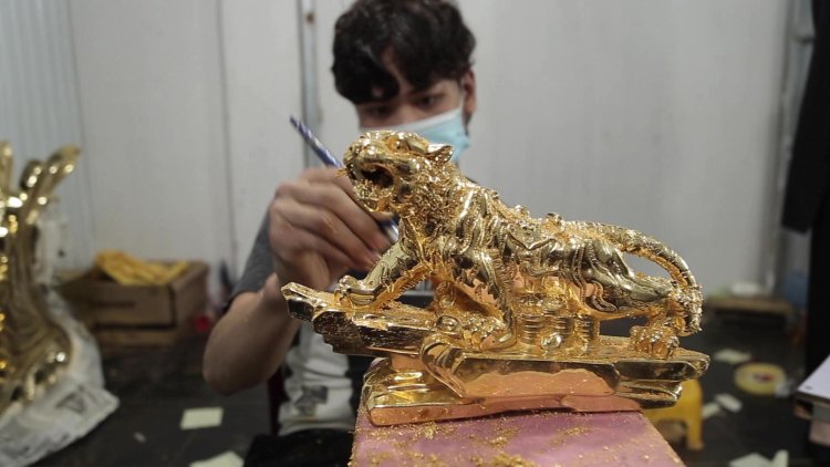 Burning bright: Vietnam's gold-plated new year tiger