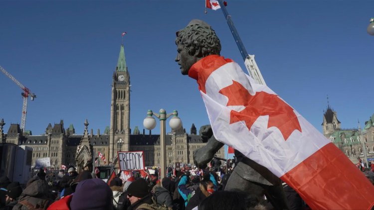 Hundreds of truckers pour into Ottawa to protest vaccine requirements