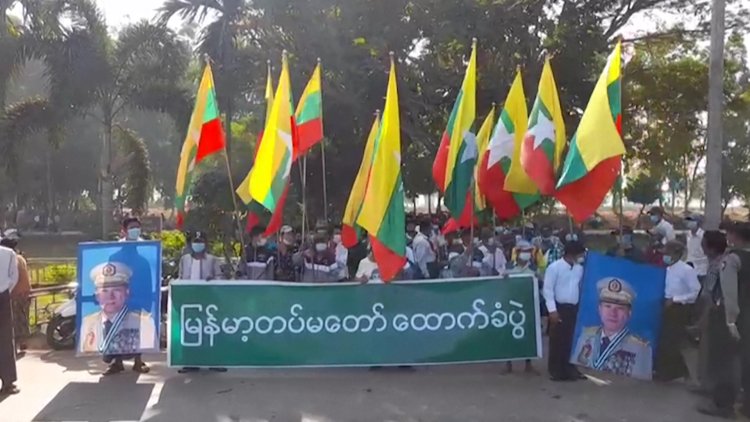 Myanmar protesters defy junta with strike and clapping protests on coup anniversary