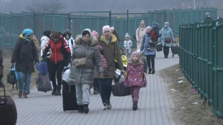 Russia to open Ukraine 'humanitarian routes', but fears persist
