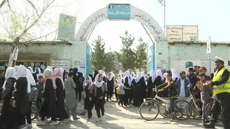 Afghan girls head back to school as Taliban end ban