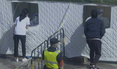 Beijing closes dozens of subway stations as Covid controls tighten