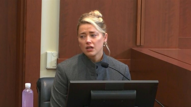 Amber Heard says trial is 'torture,' wants to 'move on'
