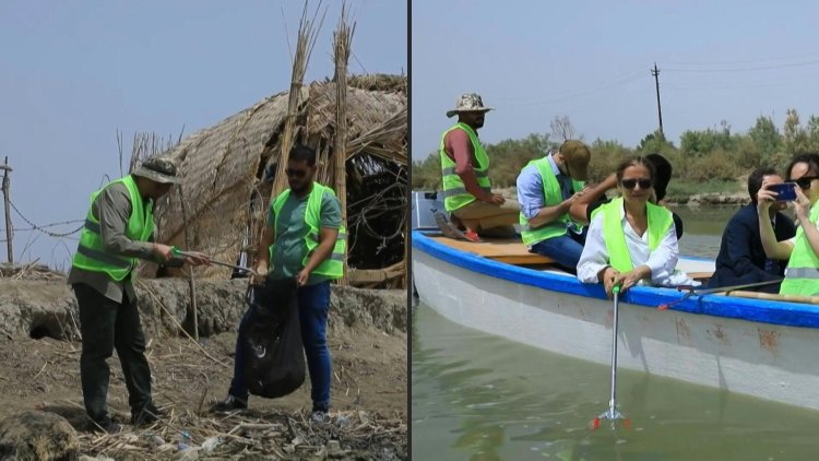 Trawling Iraq's threatened marshes to collect plastic waste