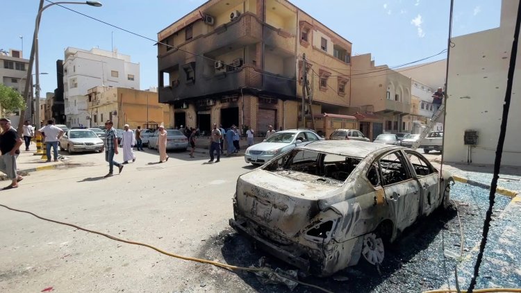 Calm in Libyan capital after clashes kill 32