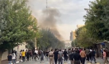 Iran protests flare as tensions grow