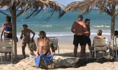 Shunned over war, Russians holiday on Venezuelan resort island