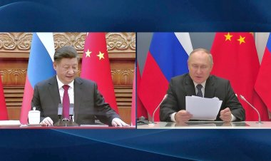 Putin tells Xi he wants to ramp up military cooperation