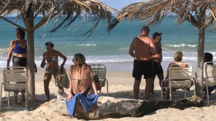 Shunned over war, Russians holiday on Venezuelan resort island