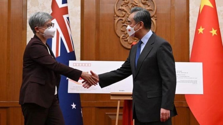 Chinese foreign minister meets his Australian counterpart in Beijing