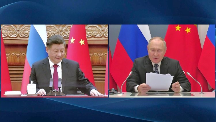 Putin tells Xi he wants to ramp up military cooperation