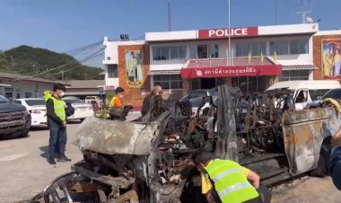 Two children among 11 burned to death in Thai van crash