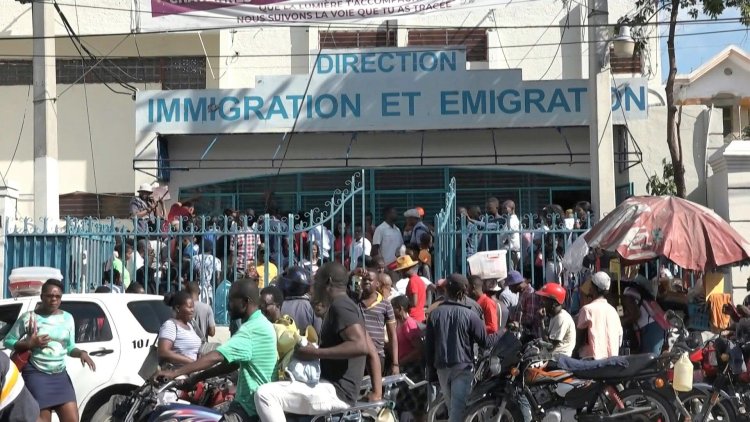 Haitians flock for passports to reach US under new program
