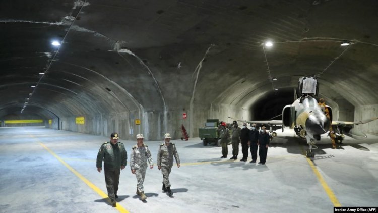 Iran unveils underground base for fighter jets
