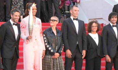 Olympic Flame Ascends Cannes Steps for Paris 2024