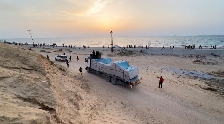 Aid Reaches Gaza via Temporary Pier Amid Heavy Fighting