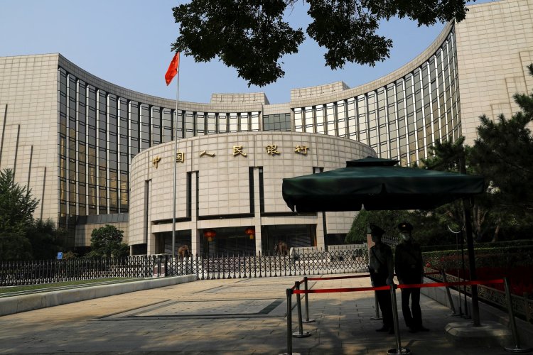 China Cuts Rates to Boost Economic Growth