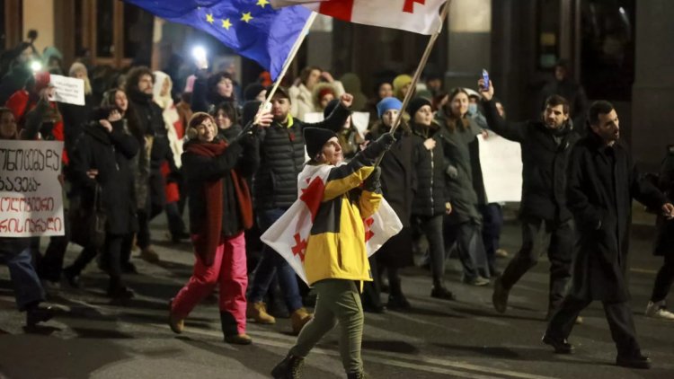 Georgian protests grow as pro-Russia candidate leads