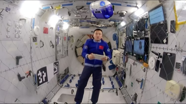 Shenzhou-19 crew tests space robot, fruit flies