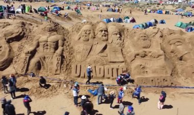 Artists craft biblical sand sculptures for Good Friday