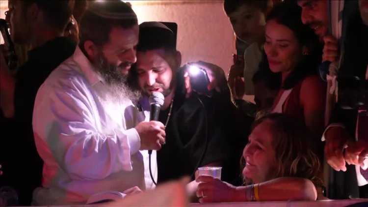 Freed Israeli hostage returns home