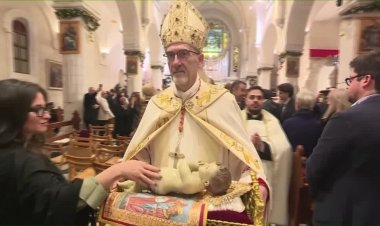 Subdued christmas mass in bethlehem