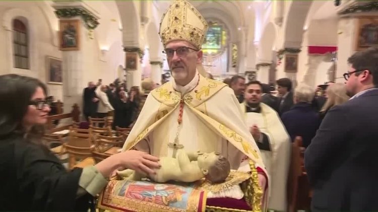 Subdued christmas mass in bethlehem