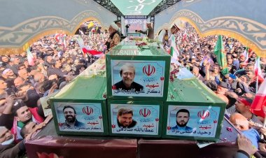 Tehran holds mass funeral for officials