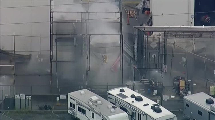 Crews battle dangerous chemical tank threat