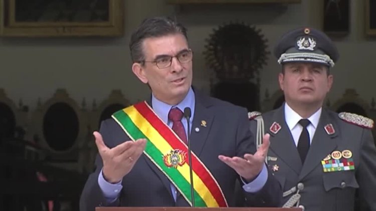 Bolivia president cuts salaries amid unrest