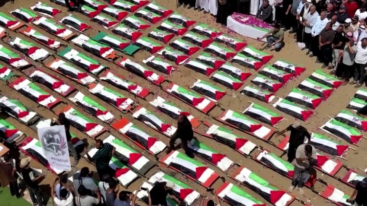 Gaza buries 112 family members from 2023 strike