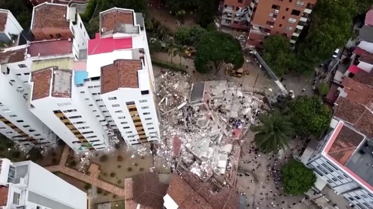 Colombia mourns quake victims, rescue race