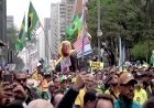 Brazilians rally for Bolsonaro in tight race
