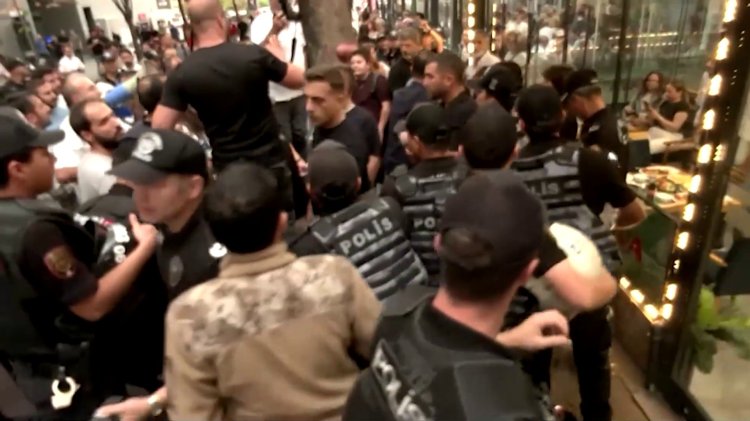 Police scuffle with LGBTQ+ protesters in Turkey