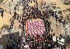 Gaza holds mass funeral for 105 Palestinians
