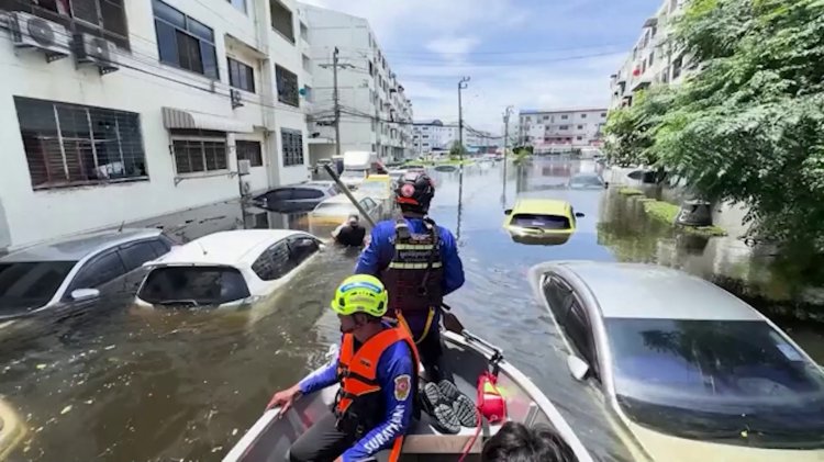 Bangkok battles widespread flood impact